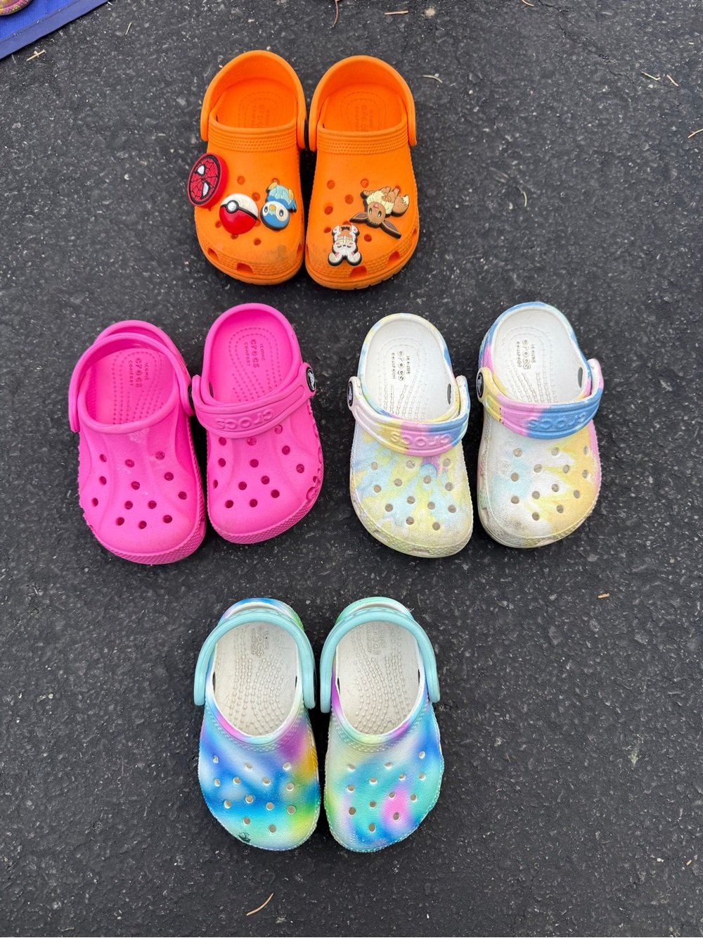 4 pairs of Kids Crocs Classic Slip-On Clogs - Orange, Hot Pink, Tie-Dye